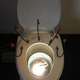 Illustration for article titled Something About Booze, Vomiting, Art, Music and a Toilet
